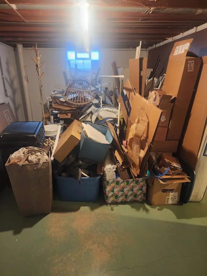 Roll-off dumpster container at job site for 15 Yard Dumpster Rental in Sikeston